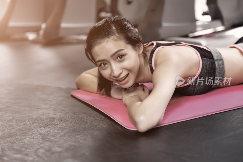 Cute girls working out in a gym